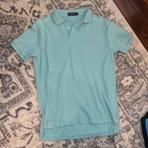 Blue/teal with pink logo polo